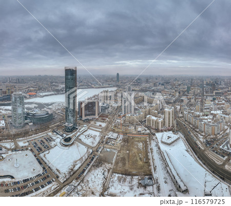 Yekaterinburg aerial panoramic view in spring at sunset. Yekaterinburg city and pond in spring or autumn. Yekaterinburg aerial panoramic view in spring at sunset. Yekaterinburg city and pond in spring or autumn. 116579725