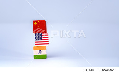 Screen printed USA flag and China flag on wooden cube, showing trade competition and tariff barriers, trade war between USA and China, global trade competition. 116583621