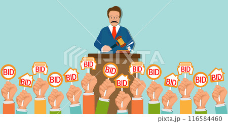 Auction process with man holding gavel behind stand. 116584460