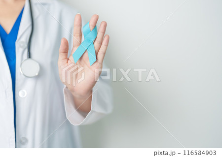 Blue November Prostate Cancer Awareness month, Doctor with Blue Ribbon in hospital for support people life and illness. Healthcare, International men, Father, Diabetes and World cancer day 116584903