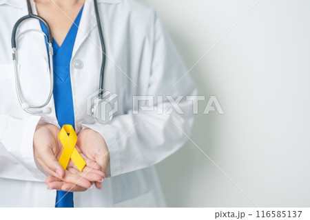 Yellow September, Suicide prevention day, Childhood, Sarcoma, bone and bladder cancer Awareness month, Yellow Ribbon for supporting people life and illness. Healthcare and World cancer day concept Yellow September, Suicide prevention day, Childhood, Sarcoma, bone and bladder cancer Awareness month, Yellow Ribbon for supporting people life and illness. Healthcare and World cancer day concept 116585137