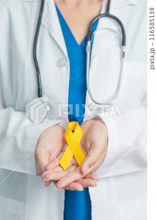Yellow September, Suicide prevention day, Childhood, Sarcoma, bone and bladder cancer Awareness month, Yellow Ribbon for supporting people life and illness. Healthcare and World cancer day concept Yellow September, Suicide prevention day, Childhood, Sarcoma, bone and bladder cancer Awareness month, Yellow Ribbon for supporting people life and illness. Healthcare and World cancer day concept 116585139