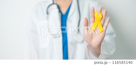 Yellow September, Suicide prevention day, Childhood, Sarcoma, bone and bladder cancer Awareness month, Yellow Ribbon for supporting people life and illness. Healthcare and World cancer day concept 116585140