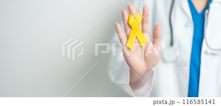 Yellow September, Suicide prevention day, Childhood, Sarcoma, bone and bladder cancer Awareness month, Yellow Ribbon for supporting people life and illness. Healthcare and World cancer day concept 116585141