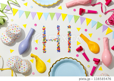 The word "hi" is made of colored plasticine on a white background. 116585476