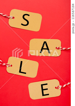 Four tags with the word sale on red background. Vertical foto Four tags with the word sale on red background. Vertical foto 116587184