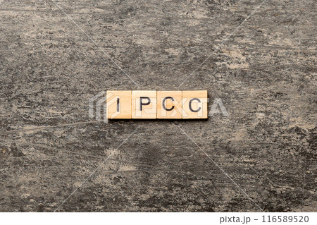 IPCC word written on wood block. abbreviation Intergovernmental Panel on Climate Change text on cement table for your desing, concept IPCC word written on wood block. abbreviation Intergovernmental Panel on Climate Change text on cement table for your desing, concept 116589520