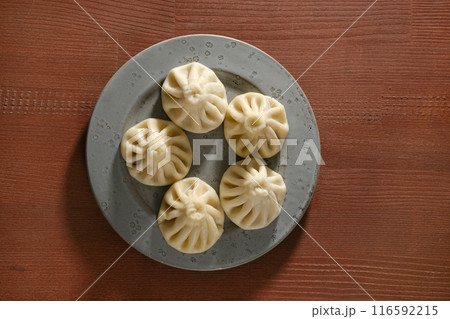 Overhead view of a plate with traditional Georgian dish khinkali 116592215
