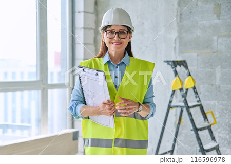 Portrait of woman builder engineer supervisor at construction 116596978