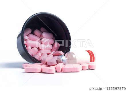 Pink pills and vaccine bottle spilled from black plastic box on white background Pink pills and vaccine bottle spilled from black plastic box on white background 116597379