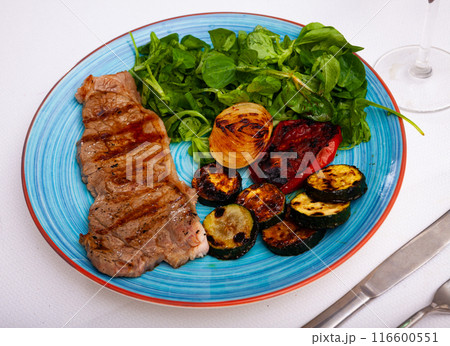 Appetizing beef entrecote with baked vegetables Appetizing beef entrecote with baked vegetables 116600551