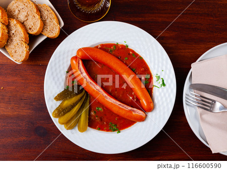 Wiener sausages with goulash sauce Wiener sausages with goulash sauce 116600590