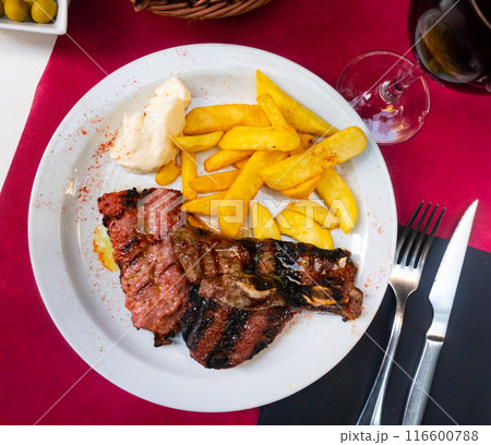 Barbecue meat served with french fries Barbecue meat served with french fries 116600788