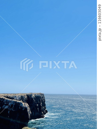 View of strong waves hitting the rock at Sagres, Algarve, Portugal. 116603049