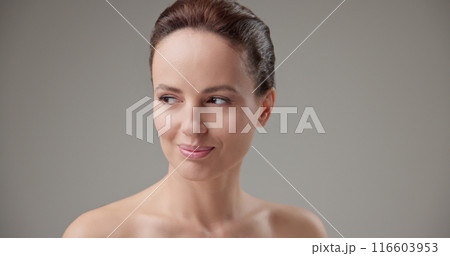 Concept of beauty, health, cosmetics, anti-aging therapy and skin care - young beautiful brunette Caucasian woman thoughtfully looks around making difficult choice thinking through actions Concept of beauty, health, cosmetics, anti-aging therapy and skin care - young beautiful brunette Caucasian woman thoughtfully looks around making difficult choice thinking through actions 116603953