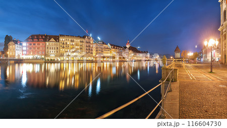 Beautiful historic city center of Lucerne with famous buildings and promanade during night.. Beautiful historic city center of Lucerne with famous buildings and promanade during night.. 116604730