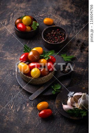 Assortment of different cherry tomatoes 116604766