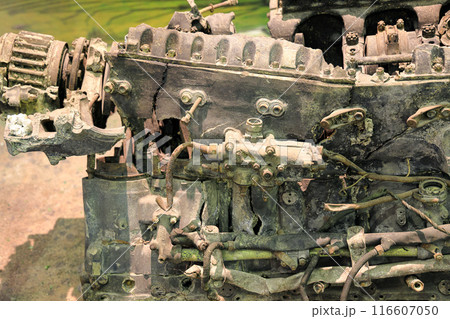 Broken Airplane cylinder engine, Vintage Airplane engine from crash plane. Broken Airplane cylinder engine, Vintage Airplane engine from crash plane. 116607050