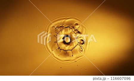 Abstract Golden Liquid Surface with Falling Drop. 116607096