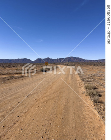 Mountains and dirt road in the Australian Outback 116608569