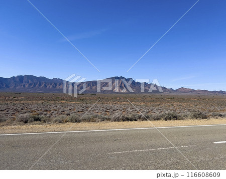 Mountains and dirt road in the Australian Outback Mountains and dirt road in the Australian Outback 116608609