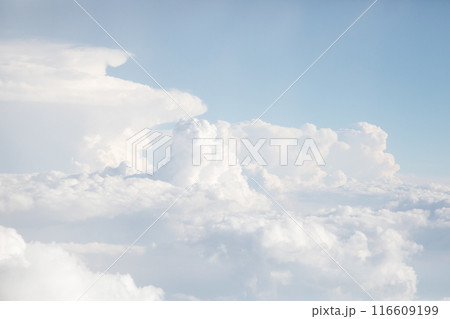 Sunrise above textured clouds from airplane window Sunrise above textured clouds from airplane window 116609199