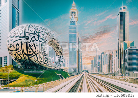 Dubai, UAE, United Arab Emirates. Monorail POV Subway train rides among skyscrapers, Museum of the Future in Dubai 116609818