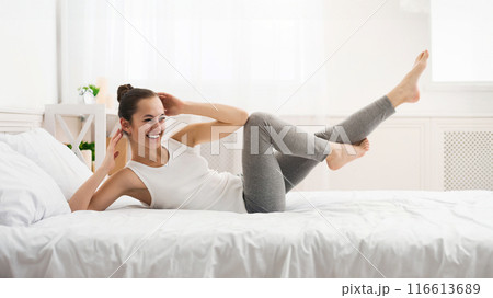 Morning Workout. Woman Doing Abs Exercise On Bed After Wake Up, Panorama 116613689