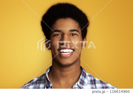 Healthy Teeth. African Guy with Beaming Smile, Looking at Camera on Orange Background Healthy Teeth. African Guy with Beaming Smile, Looking at Camera on Orange Background 116614960