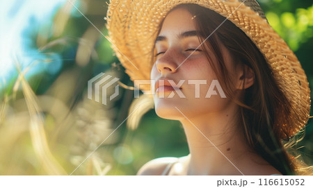 炎天下で汗をかく若い女性 116615052