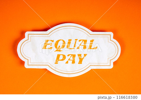 Equal Pay. Paper sticky note with text on an orange background 116618380