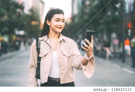 Youth asian woman using smartphone urban teenager gen z lifestyles 116622113