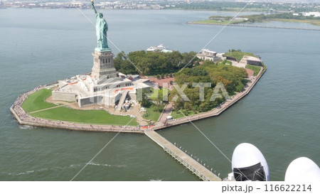 New York City doors off helicopter flight, Manhattan USA. Feet in sneakers, legs in shoes selfie pov 116622214