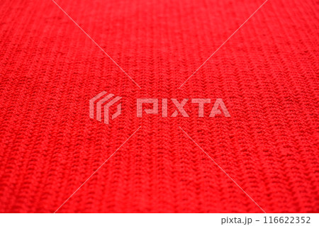 texture of red wool knitted yarn, woolen fabric background texture of red wool knitted yarn, woolen fabric background 116622352