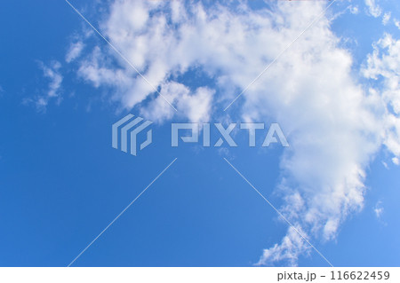 beautiful blue sky and white fluffy group of clouds with sunrise in the morning, natural background 116622459