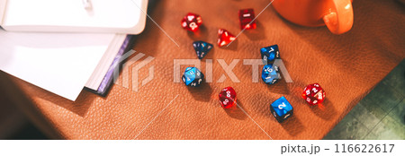 Many dice place on character paper for create begin fantasy and adventure role playing tabletop and board games Many dice place on character paper for create begin fantasy and adventure role playing tabletop and board games 116622617