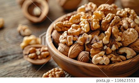 Peeled walnuts in bowl. Generative AI Peeled walnuts in bowl. Generative AI 116623553