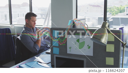 Image of financial data processing against thoughtful caucasian man sitting at office 116624207