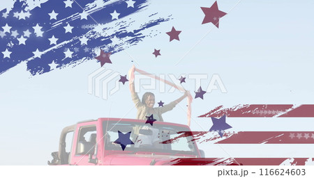 Image of flag of usa over happy diverse women in car by beach in summer 116624603