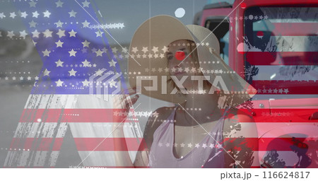 Image of flag of usa over caucasian woman by car on beach 116624817