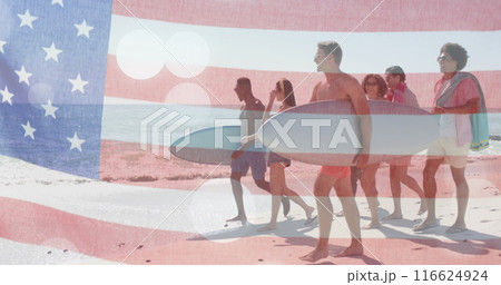 Image of flag of usa over happy diverse friends on beach in summer Image of flag of usa over happy diverse friends on beach in summer 116624924