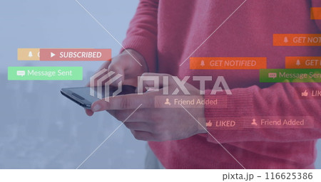 Image of social media icons floating against mid section of man using smartphone Image of social media icons floating against mid section of man using smartphone 116625386