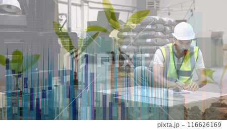 Plant sampling over caucasian male worker writing on notepad looking at delivery boxes at warehouse Plant sampling over caucasian male worker writing on notepad looking at delivery boxes at warehouse 116626169