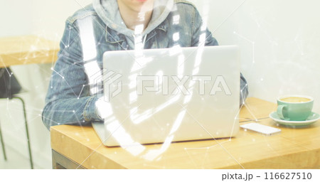 Image of padlock in shield and connected dots forming shapes over caucasian man using laptop 116627510