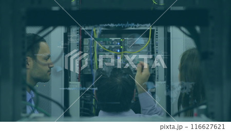 Image of data processing over team of diverse engineers working at computer server room 116627621