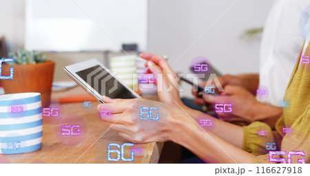 Image of multiple 6g texts over diverse people using digital tablet in office 116627918