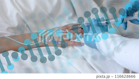 Administering IV treatment, healthcare professional wearing gloves attending patient 116628666