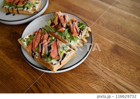 healthy sandwich with cream cheese, red fish and avocado for breakfast 116629732