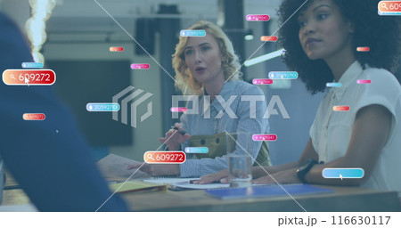 Image of social media icons over caucasian woman talking to diverse colleagues at office 116630117