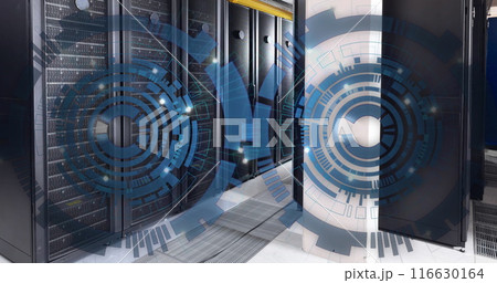 Image of two blue round scanner spinning against computer server room 116630164